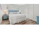 Guest bedroom with queen bed and closet at 106 7Th S St, Bradenton Beach, FL 34217