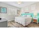 King-size bed, teal headboard, and white dresser in bedroom at 106 7Th S St, Bradenton Beach, FL 34217