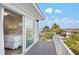 Bright bedroom with balcony access and ocean view at 106 7Th S St, Bradenton Beach, FL 34217