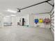 Spacious garage with ping pong table and refrigerator at 106 7Th S St, Bradenton Beach, FL 34217