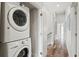 Convenient laundry room with stackable washer and dryer at 106 7Th S St, Bradenton Beach, FL 34217