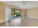 Living room with sliding glass doors and neutral color scheme at 11546 52Nd E Ct, Parrish, FL 34219