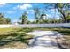 Large backyard with a paved patio and stepping stones at 1205 29Th W St, Bradenton, FL 34205