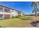 Backyard of condo with screened patio and golf course view at 13816 Messina Loop # 203, Bradenton, FL 34211