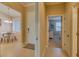 Hallway with access to the living room, breakfast area, and bedroom at 13816 Messina Loop # 203, Bradenton, FL 34211
