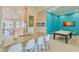 Modern kitchen with breakfast bar and view into game/living room at 13816 Messina Loop # 203, Bradenton, FL 34211