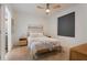 Modern bedroom with large window and dresser at 1703 N Tamiami Trl # 210, Sarasota, FL 34234