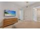 Main bedroom with large TV and ensuite bathroom at 1703 N Tamiami Trl # 210, Sarasota, FL 34234