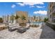 Cozy fire pit area with comfortable seating for outdoor relaxation at 1703 N Tamiami Trl # 210, Sarasota, FL 34234