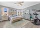 Serene main bedroom with a cozy bed, soft lighting, and neutral tones for a relaxing atmosphere at 17335 Polo Trl, Bradenton, FL 34211