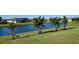 Homes back up to a tranquil lake at 1825 Twin Rivers Trl, Parrish, FL 34219