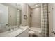 Clean bathroom with a shower/tub combo and modern vanity at 1825 Twin Rivers Trl, Parrish, FL 34219