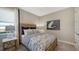 Cozy bedroom with a queen-size bed and tasteful decor at 1825 Twin Rivers Trl, Parrish, FL 34219