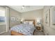 Serene bedroom with a queen-size bed and natural light at 1825 Twin Rivers Trl, Parrish, FL 34219