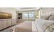 Spacious bedroom with large windows and a king-size bed at 1825 Twin Rivers Trl, Parrish, FL 34219