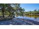 Sandy boat ramp with a tranquil waterfront view at 1825 Twin Rivers Trl, Parrish, FL 34219