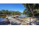 Private dock on a calm river at 1825 Twin Rivers Trl, Parrish, FL 34219