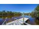 Serene river view from dock at 1825 Twin Rivers Trl, Parrish, FL 34219