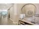 Elegant entryway with mirror and modern decor at 1825 Twin Rivers Trl, Parrish, FL 34219