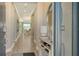 Bright and spacious entryway with tile floors and console table at 1825 Twin Rivers Trl, Parrish, FL 34219
