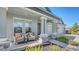 Front porch with wicker chairs and a welcoming atmosphere at 1825 Twin Rivers Trl, Parrish, FL 34219
