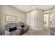 Spacious Gathering room with comfortable seating and neutral decor at 1825 Twin Rivers Trl, Parrish, FL 34219