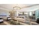 Open concept living space with a modern kitchen and seating area at 1825 Twin Rivers Trl, Parrish, FL 34219