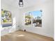 Spacious office with hardwood floors and large windows offering natural light at 1900 20Th N Ave, St Petersburg, FL 33713