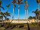 Gran Paradiso community entrance with festive holiday decor at 20680 Vita Ct, Venice, FL 34293