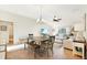 Charming dining room with a rustic table and bench seating at 20680 Vita Ct, Venice, FL 34293