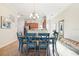 Quaint dining area featuring a light blue table and chairs at 20680 Vita Ct, Venice, FL 34293