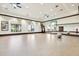 Bright and spacious exercise room with mirrors and equipment at 20680 Vita Ct, Venice, FL 34293