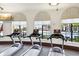 Cardio equipment with pool views in fitness center at 20680 Vita Ct, Venice, FL 34293
