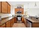 Well-equipped kitchen with granite countertops and ample cabinet space at 20680 Vita Ct, Venice, FL 34293
