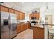 Spacious kitchen with stainless steel appliances and granite countertops at 20680 Vita Ct, Venice, FL 34293