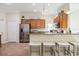 Updated kitchen with wood cabinets and stainless steel appliances at 20680 Vita Ct, Venice, FL 34293