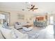 Open living room and dining area with hardwood floors and neutral decor at 20680 Vita Ct, Venice, FL 34293