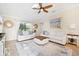 Spacious living room with large windows and ample natural light at 20680 Vita Ct, Venice, FL 34293