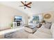 Relaxing living room featuring a neutral color palette and comfortable seating at 20680 Vita Ct, Venice, FL 34293