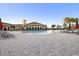 Resort-style pool with ample lounge chairs and a clubhouse at 20680 Vita Ct, Venice, FL 34293