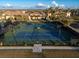 Well-maintained tennis courts in a residential community at 20680 Vita Ct, Venice, FL 34293