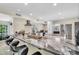 Modern kitchen with marble countertops and stainless steel appliances at 214 Gaines Ave, Sarasota, FL 34243