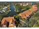 Wider aerial view of community and surrounding waterways at 2251 Jessie Harbor Dr # 2101, Osprey, FL 34229