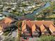 Aerial view of condo building and parking at 2251 Jessie Harbor Dr # 2101, Osprey, FL 34229