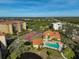 Aerial view of community with tennis courts and pool at 2251 Jessie Harbor Dr # 2101, Osprey, FL 34229