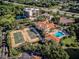Aerial view of community tennis courts and pool at 2251 Jessie Harbor Dr # 2101, Osprey, FL 34229