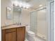Bathroom with corner vanity, toilet, and shower at 2251 Jessie Harbor Dr # 2101, Osprey, FL 34229