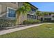 Building exterior with landscaping and walkway at 2251 Jessie Harbor Dr # 2101, Osprey, FL 34229