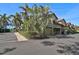 Building exterior showcasing attached garages and landscaping at 2251 Jessie Harbor Dr # 2101, Osprey, FL 34229