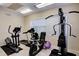 Small fitness center with cardio and weight equipment at 2251 Jessie Harbor Dr # 2101, Osprey, FL 34229